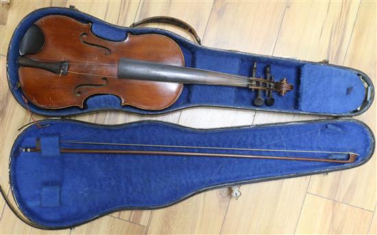 A cased violin, a bow etc